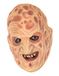 A Nightmare on Elm Street Freddy Krueger prosthetic teeth costume accessory for adults.