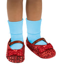 The Wizard of Oz Dorothy shoe covers costume accessory for kids.