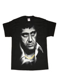 Scarface Tony Montana face graphic on a black adult t-shirt.