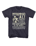 Muhammad Ali 64 not bragging graphic on a blue adult t-shirt.