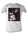 Jimi Hendrix playing guitar graphic on a white adult t-shirt.