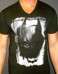 Batman The Dark Knight Rises knight eye graphic on a black adult t-shirt.