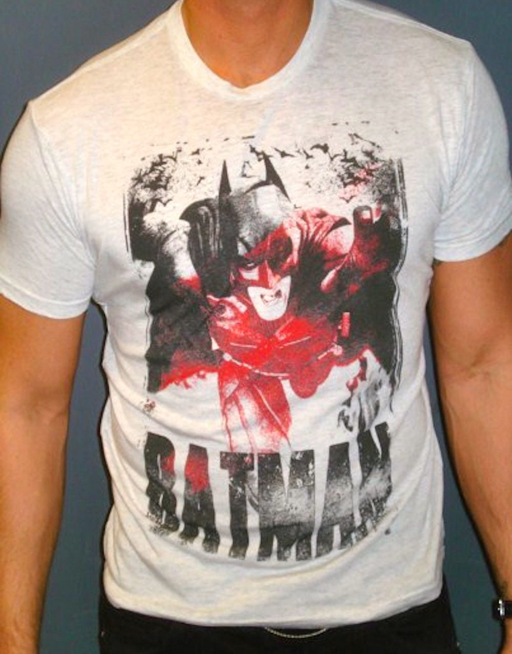 Batman The Dark Knight red face graphic on a light grey heathered adult t-shirt.