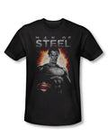 Man of Steel sun graphic on a black adult t-shirt.